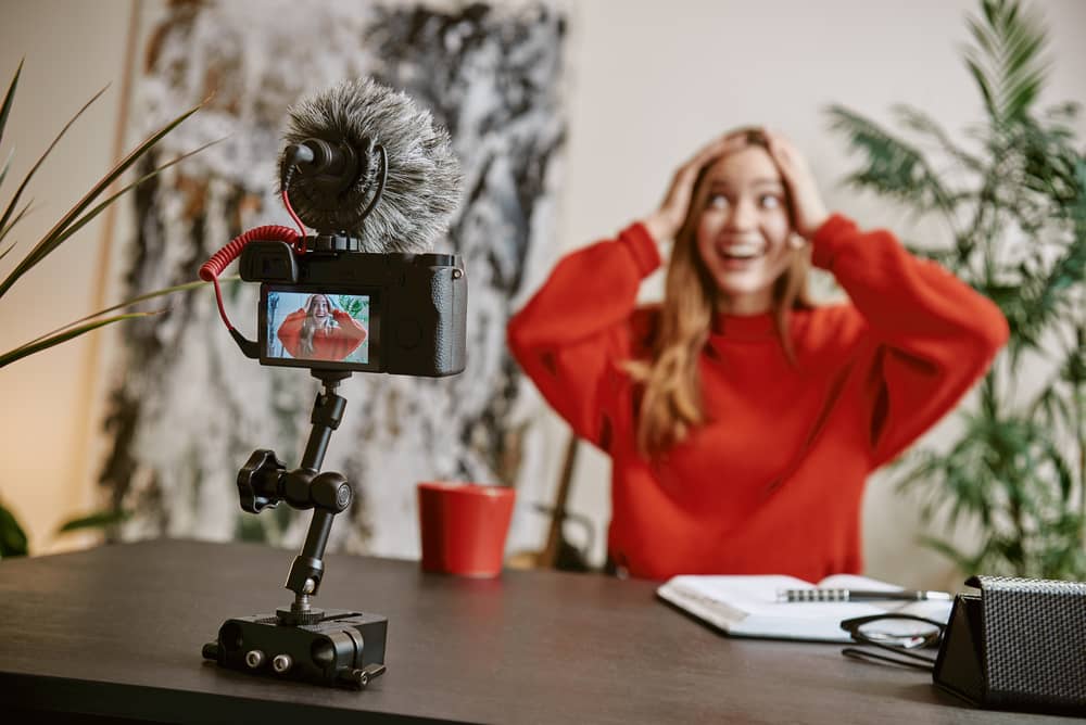 Female YouTuber looking surprised