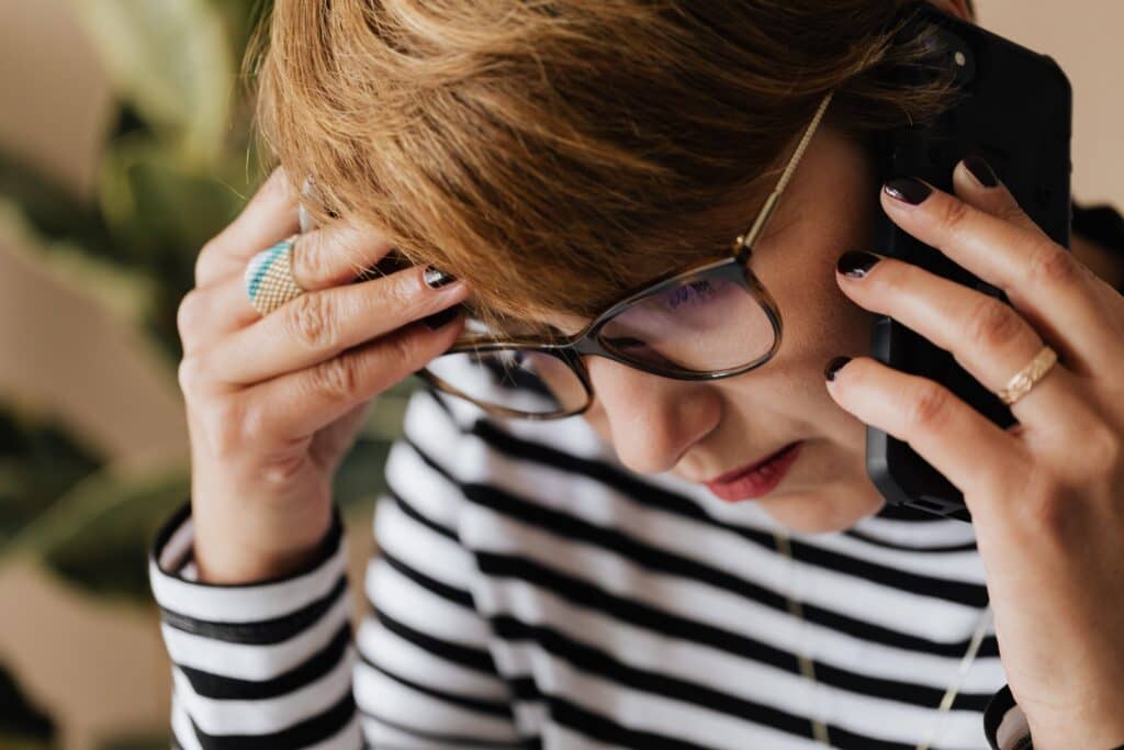 woman anxious while calling someone